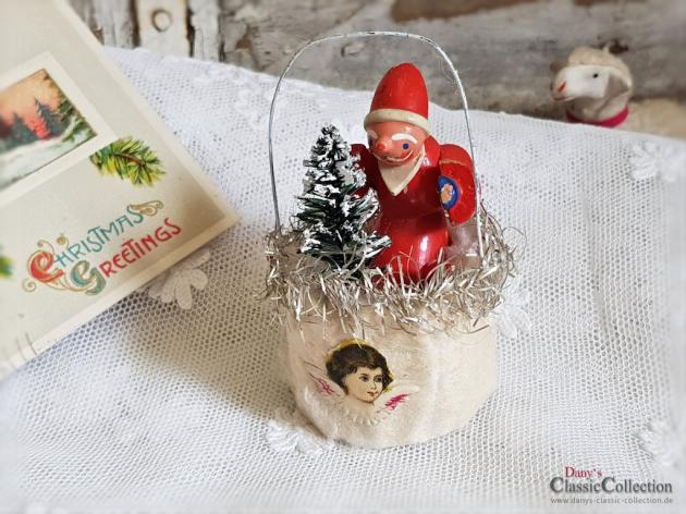 Watteschmuck , Erzgebirgemännlein in Wattekörbchen mit Tannenbaum , Oblate , Tinsel , Seltener Christbaumschmuck